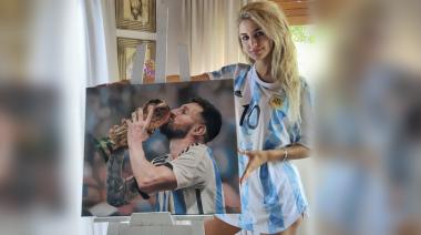 La muralista de Messi y el Papa